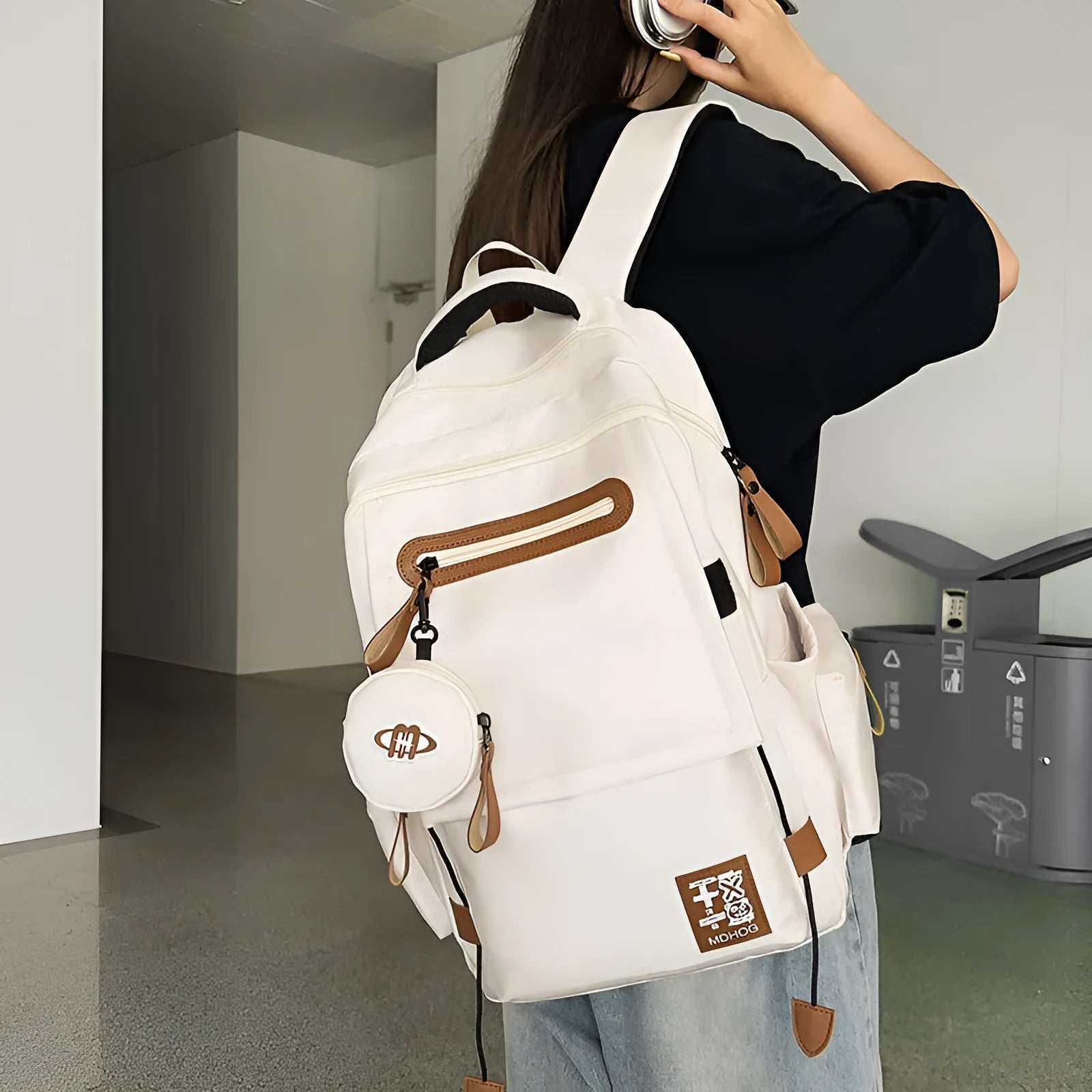 Japanese large capacity leisure travel backpack in khaki with contrast stitching and nylon waterproof finish