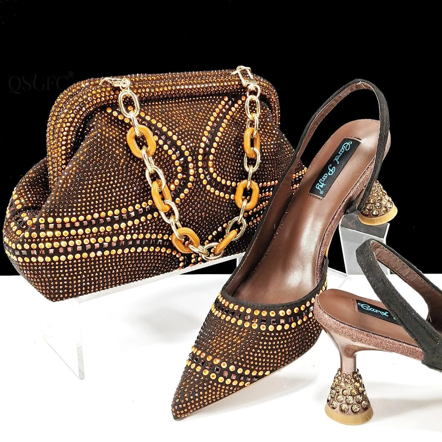Women's pointed toe high heels with rhinestones and a matching small bag, shown in one of eight available colours.