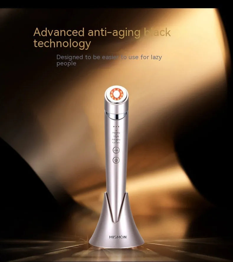 Pulse RF beauty instrument in mist blue held in hand, showing silicone head and control button
