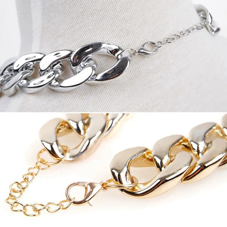 Geometric twisted chain dog collar in metallic colours showing adjustable buckle and chain links