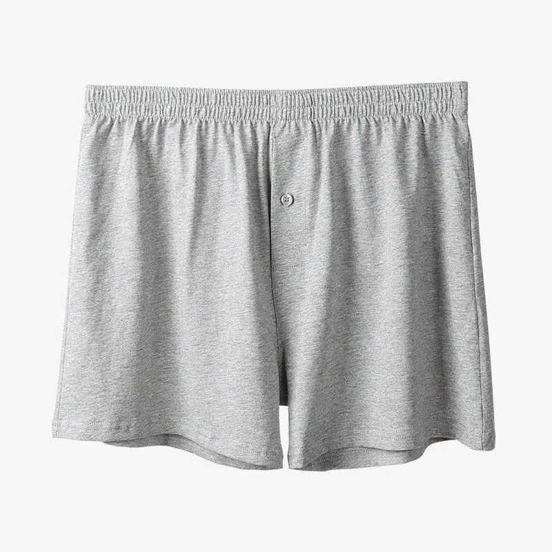 Men's light grey cotton boxer shorts with high waist and loose fit design