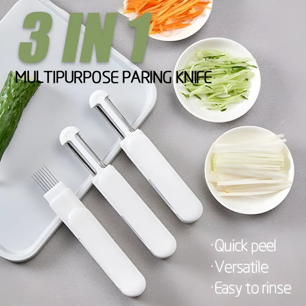 White 3 in 1 rotary paring knife with 360 degree rotating stainless steel blade on a kitchen counter