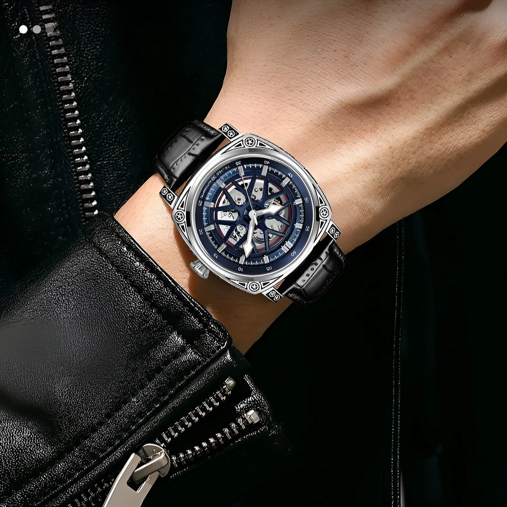 Men's stainless steel automatic watch with a blue leather strap showing time on dial.