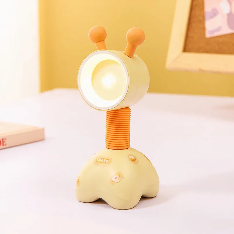 Cartoon animal magnetic night lamp with adjustable head on metallic surface