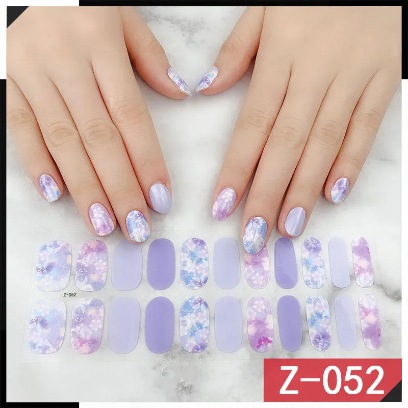 Korean Exquisite Nail Stickers pack showing colourful cartoon, floral, and embellished designs with included nail file.