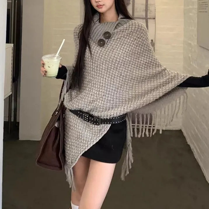 Women's triangle shawl cape in plush cashmere blend fabric with tassel detailing