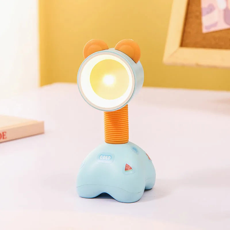 Cartoon animal magnetic night lamp with adjustable head on metallic surface