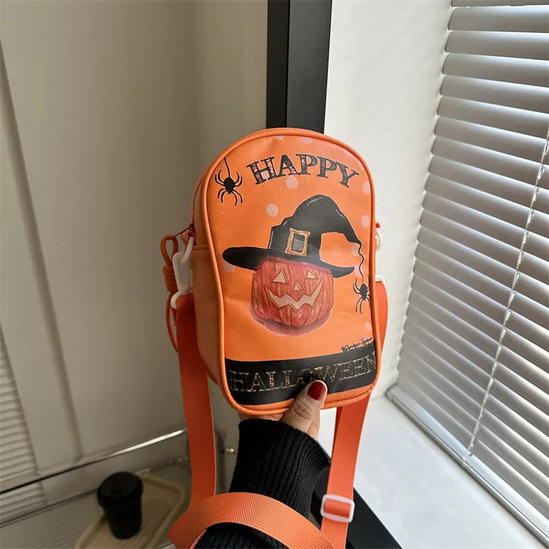 Black Halloween graffiti crossbody bag with pumpkin, ghost, and bat print