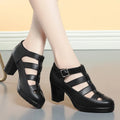 Women's beige closed toe sandals with chunky heel, ankle strap, buckle, and back zipper.