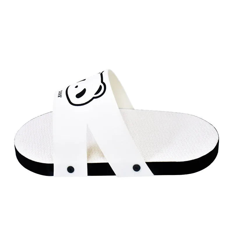 White corrugated paper cat scratch board in slipper style design on flat surface
