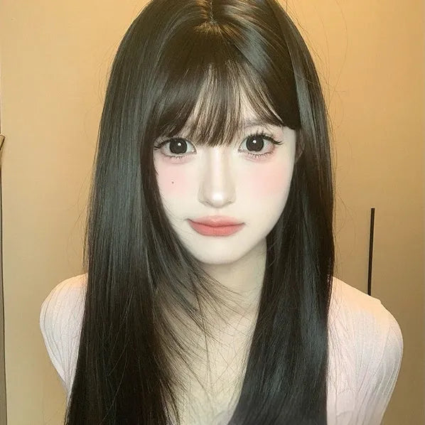 Dark brown long straight women's wig with bangs on wig head