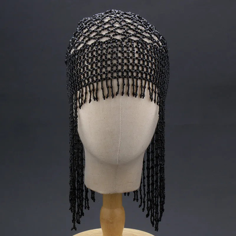 Handmade beaded belly dance head ornament with tassel on alloy mesh, in silver or black.