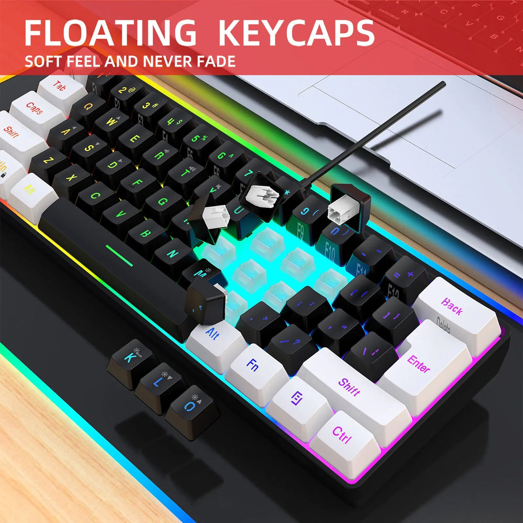Simple wired white and black 61-key membrane keyboard with a USB cable on a desk