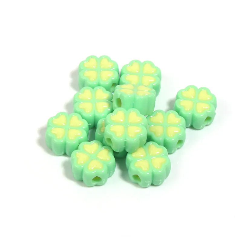 Assortment of 15mm frosted acrylic four-leaf clover beads in rose red, pink, yellow, green, blue, and purple colours.