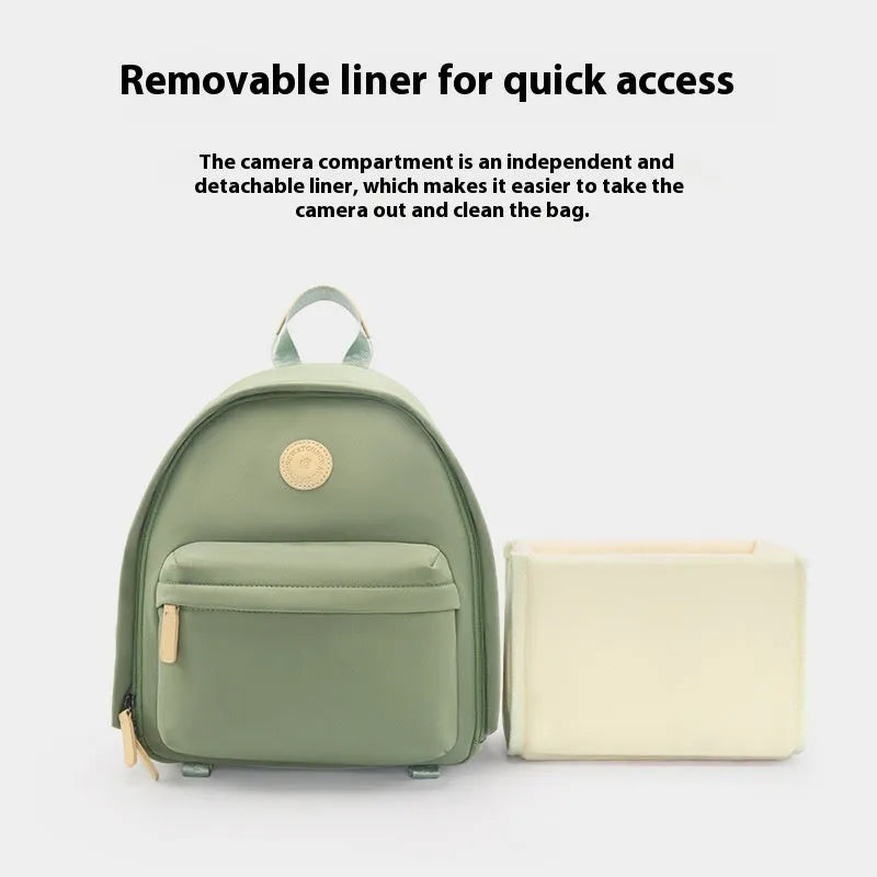 Solid colour shoulder camera bag for women with a detachable iPad compartment and a curve shoulder strap.