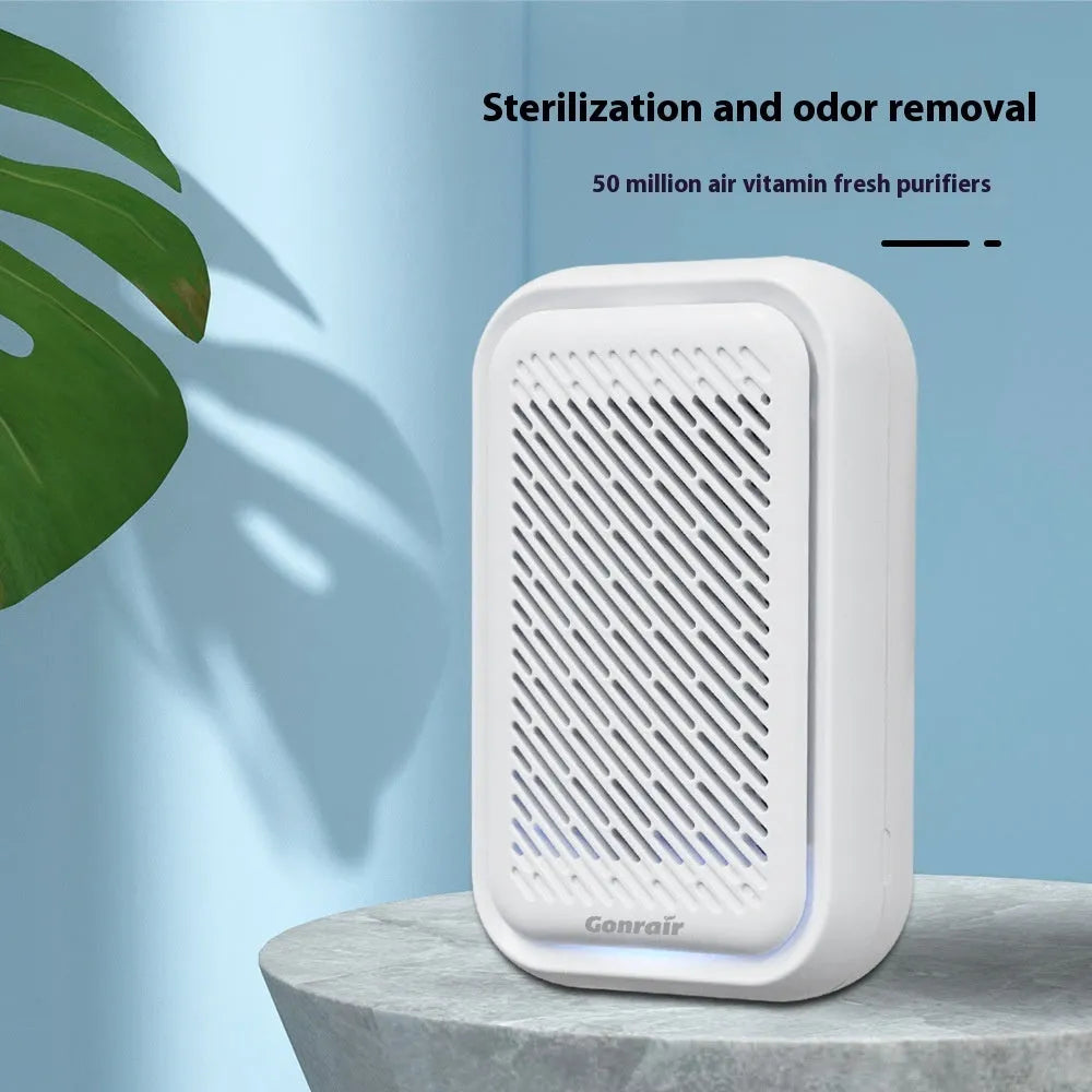 White wall-mounted air purifier with direct plug-in design for small rooms