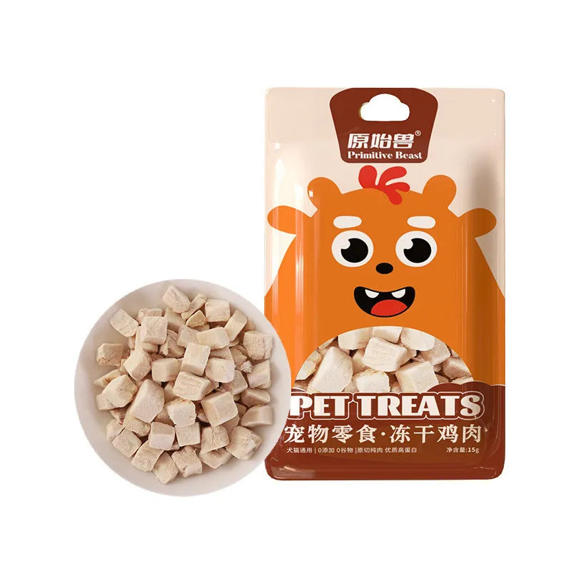 Assorted freeze-dried pet snacks including chicken, salmon, egg yolk, and rabbit blood in small resealable packs for dogs and cats