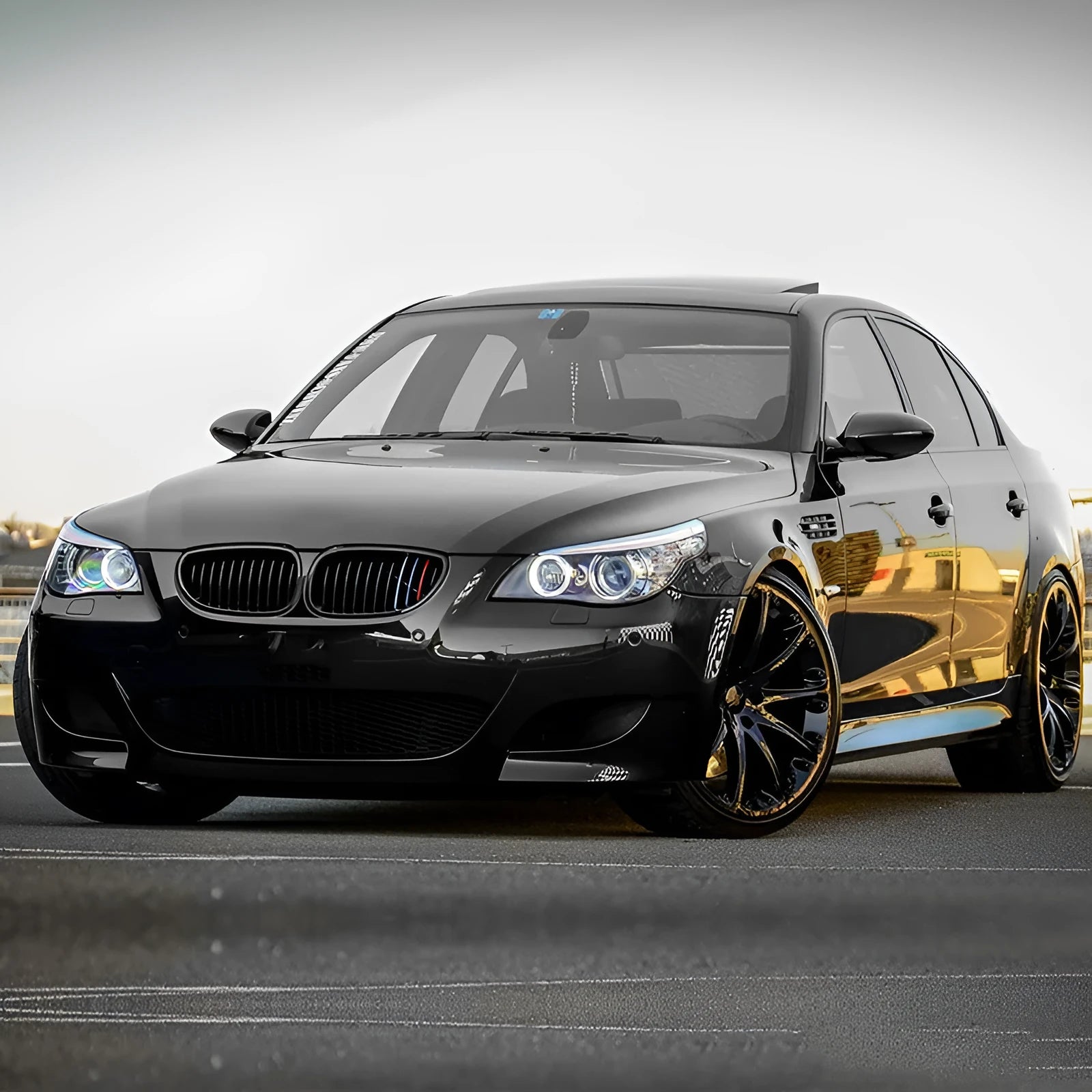 Pair of black ABS carbon fibre texture front grilles for BMW 5-Series E39 E60 E66 models.