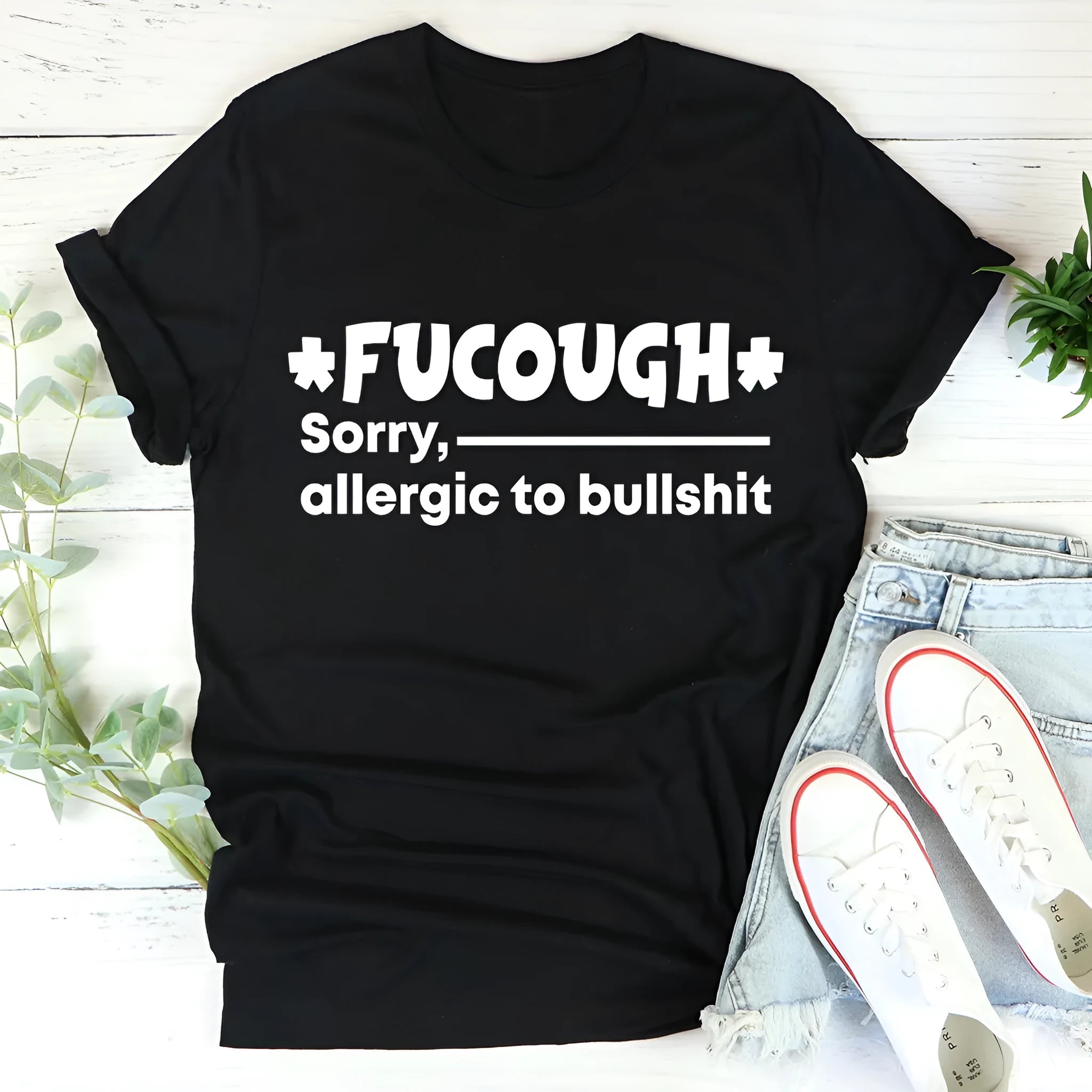 Straight cut black cotton T-shirt with short sleeves and round neck design