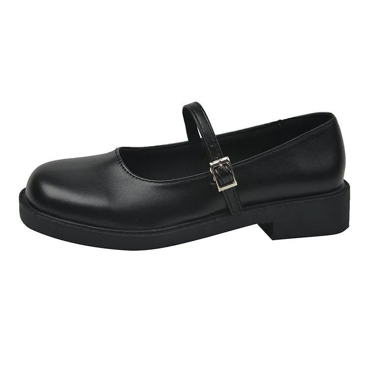 Women's solid colour flat shoes with round toe in red, black, and grey options