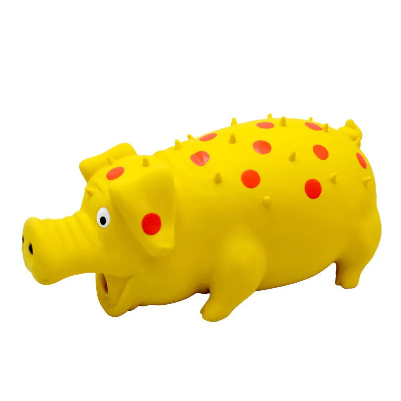Pig-shaped latex squeaky dog chew toy in various colours with textured surface