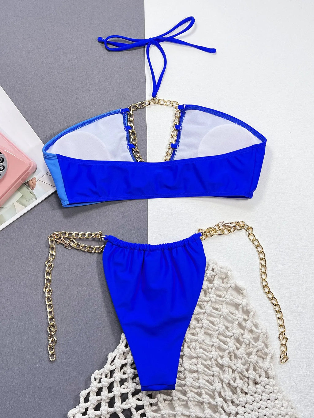 Solid blue women's nylon bikini swimsuit on a white background