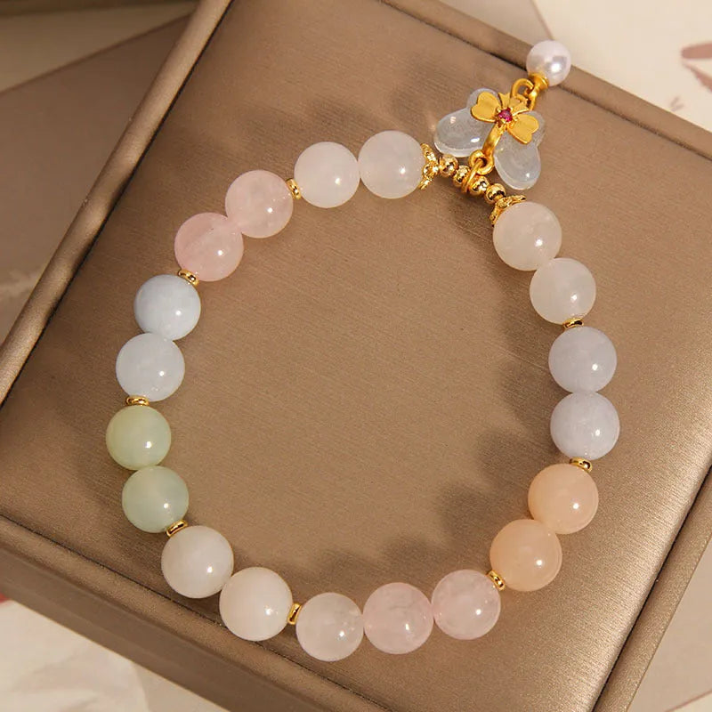 Women's crystal bracelet with colourful morganite butterfly pendant on an adjustable chain.