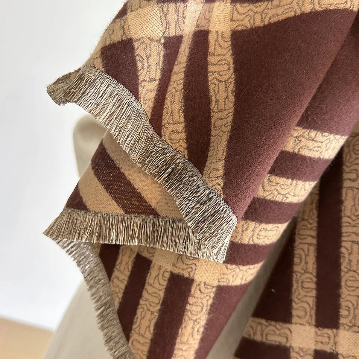 Imitation cashmere scarf with tassels in four colour options on mannequin