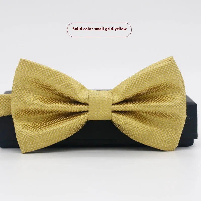 Solid colour polyester bow tie with flat head design measuring 12cm by 6cm