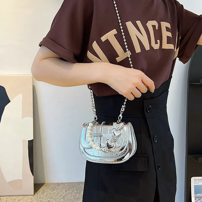 Women's laser pearl tote saddle crossbody bag in silver with street trend design