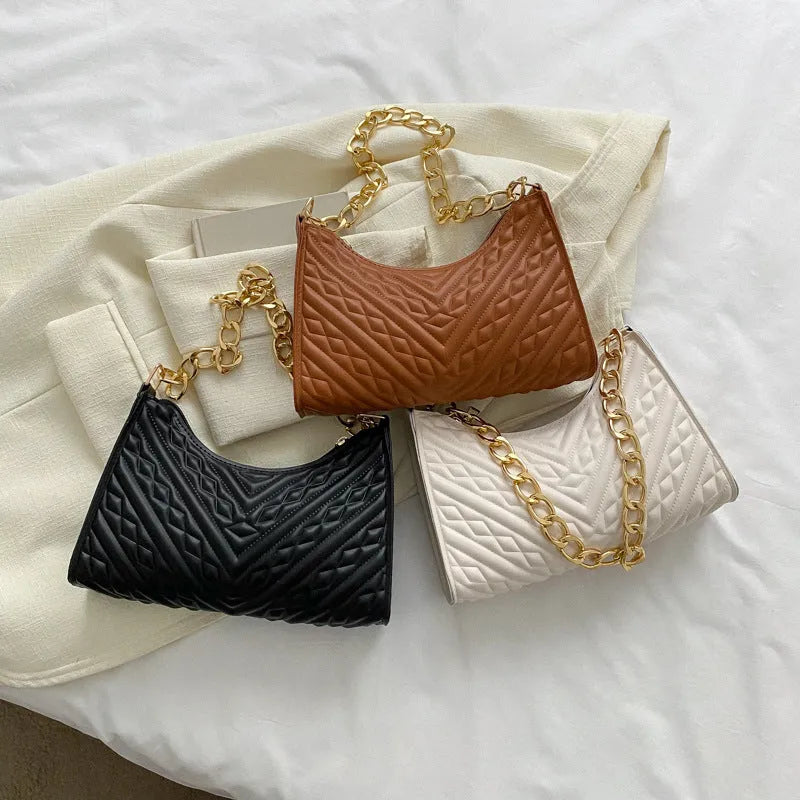 PU leather pleated chain baguette bag in vertical square shape with shoulder strap and carry handle