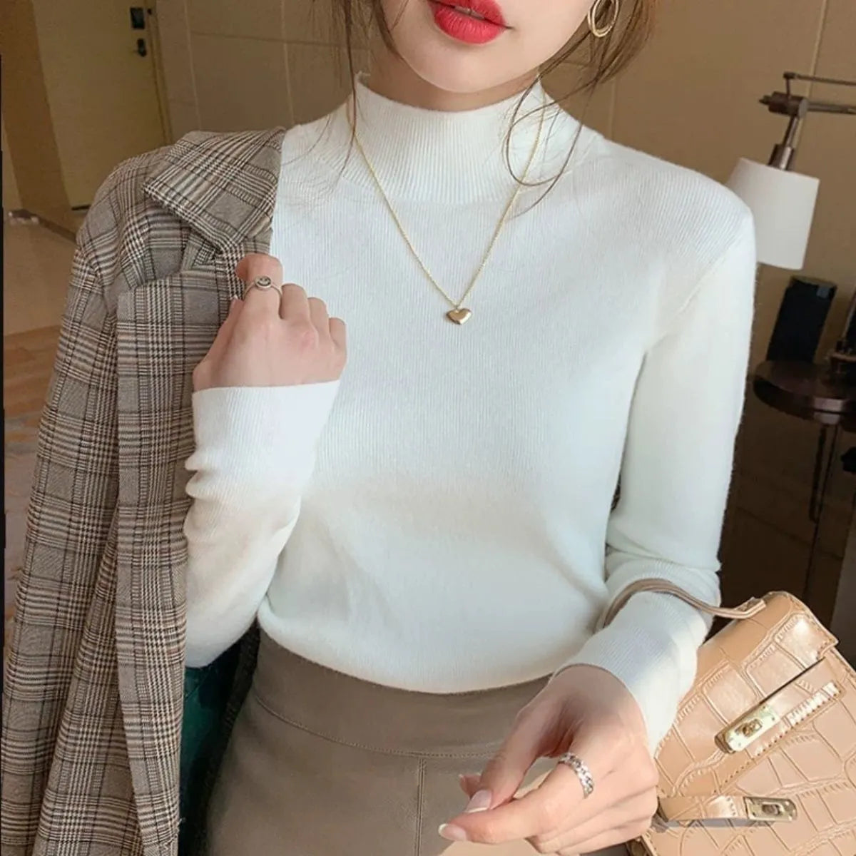 Viscose pullover top slim fit long sleeve in apricot colour showing front view
