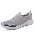 Blue, black, and grey low-top women's casual sneakers with mesh interior and PU midsole.