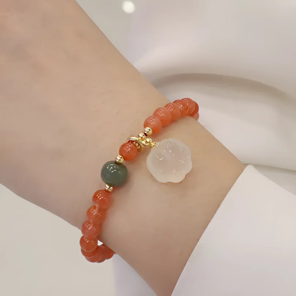 Natural red agate bracelet with jade and cat paw motif polished 6mm beads