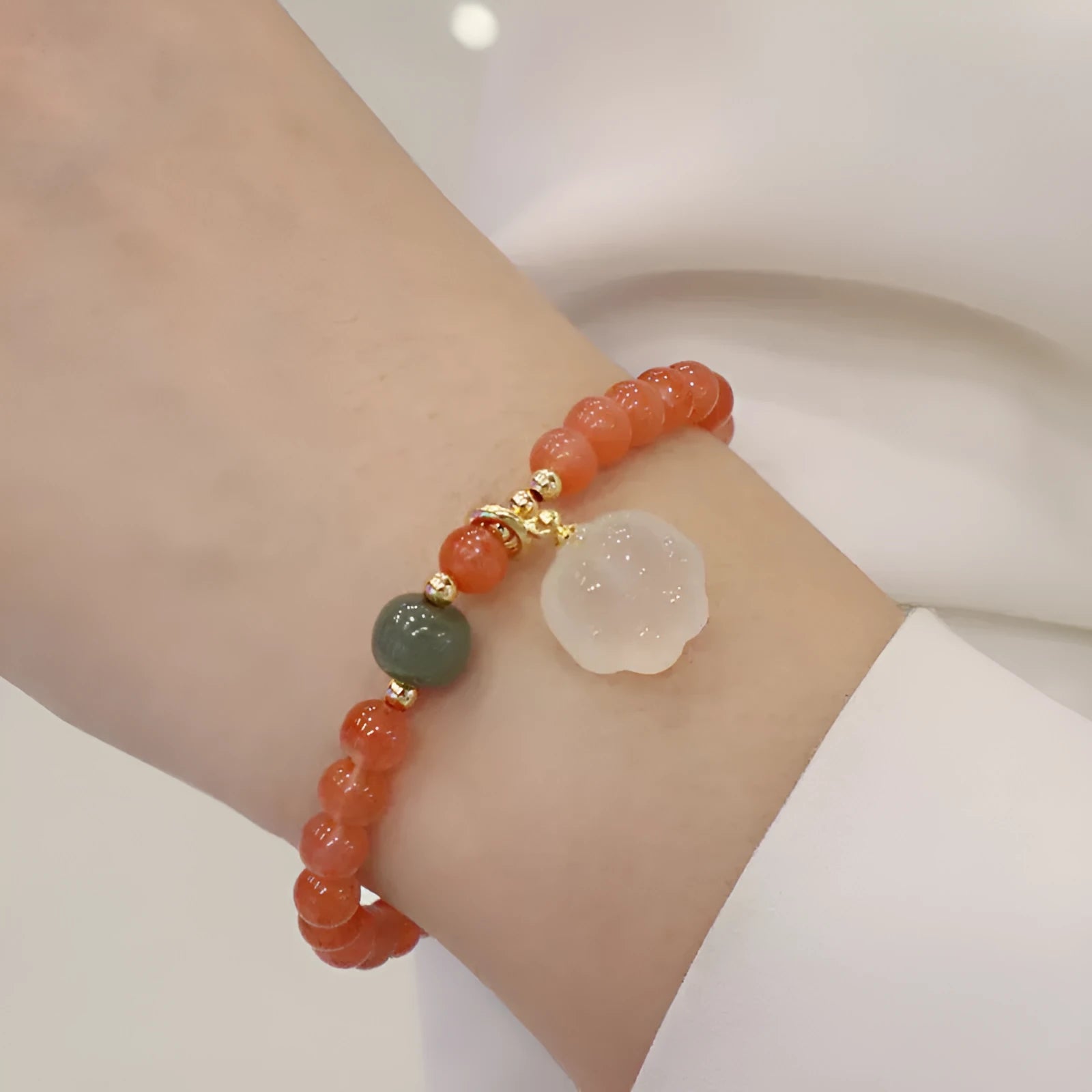 Natural red agate bracelet with jade and cat paw motif polished 6mm beads