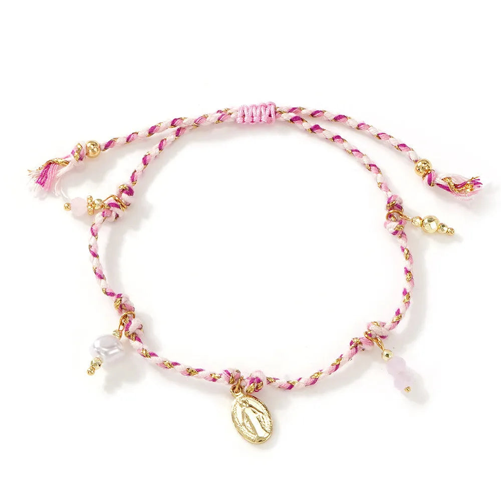 Close-up of a colourful hand-woven braided rope bracelet for women in ethnic style.