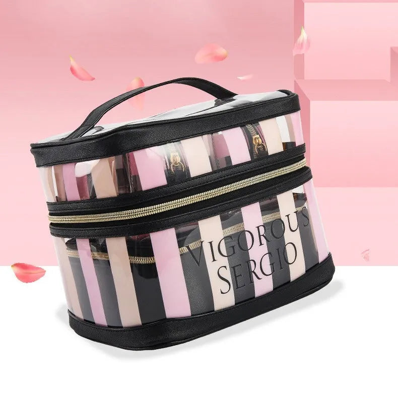 Pink striped waterproof makeup bag with flower pattern and synthetic leather construction