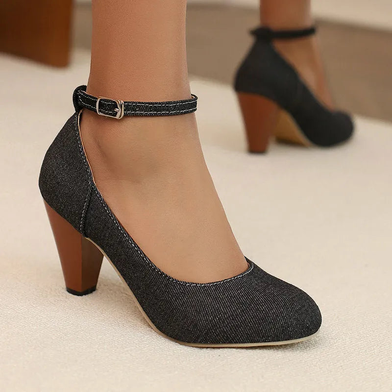 Women's blue denim platform high heels with an ankle buckle and waterproof sole.