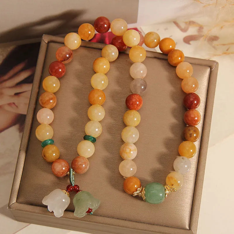 Natural jade multi-layer bracelet with orchid pendant charm and adjustable closure