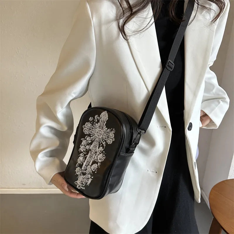 Black Halloween graffiti crossbody bag with pumpkin, ghost, and bat print