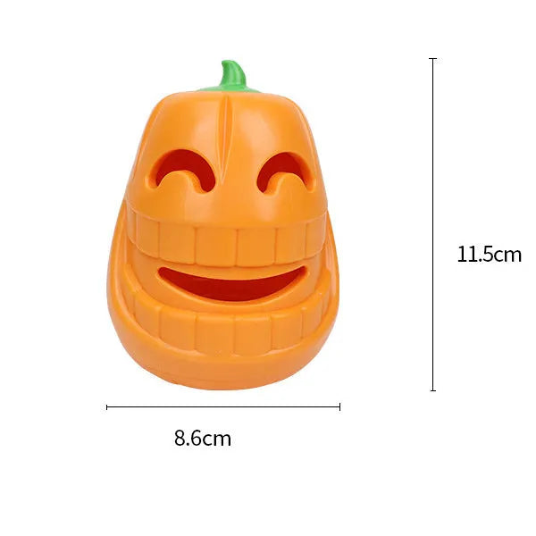 Orange Halloween pumpkin shaped rubber dog toy with a central treat-dispensing funnel.