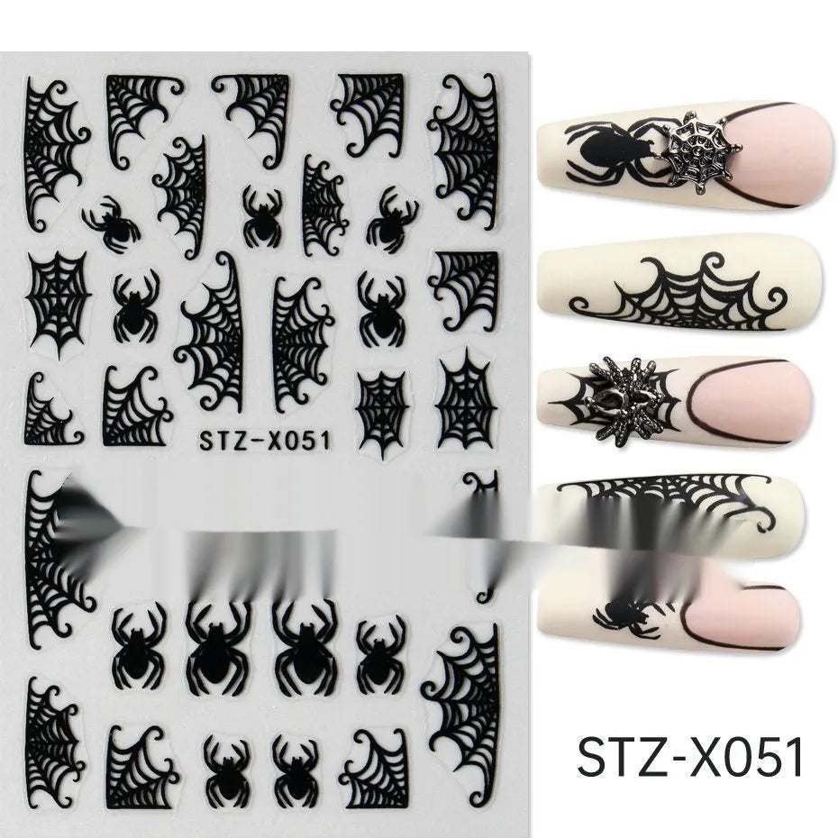 Sheet of black and silver strip nail art stickers with cartoon and love heart designs