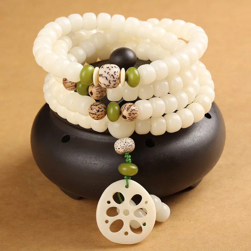 White jade Bodhi beads long bracelet with 6x8mm beads, showing various style options.