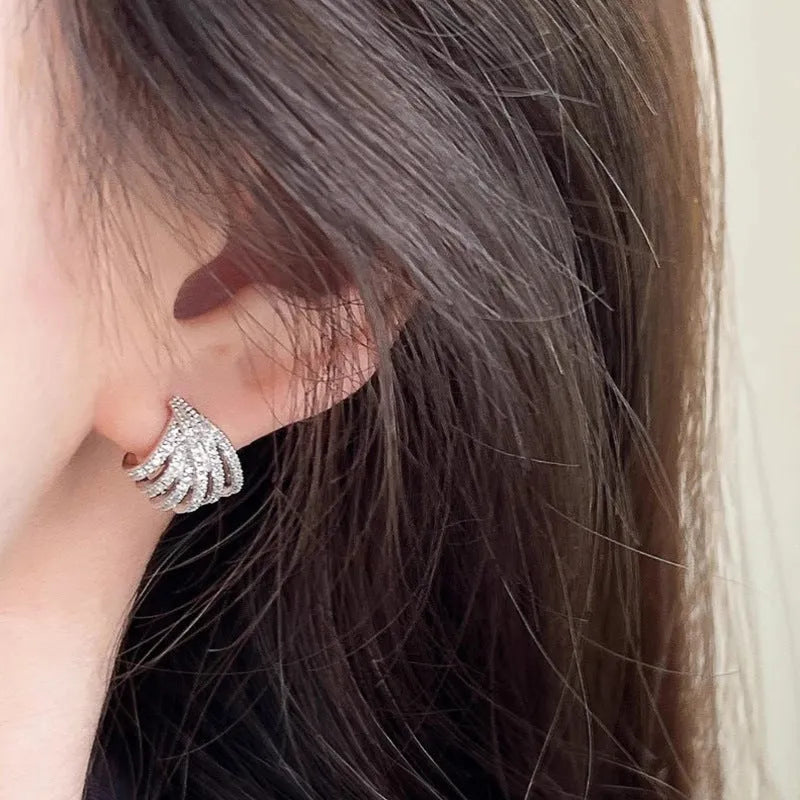 Women's geometric line design earrings in platinum zircon with electroplated finish