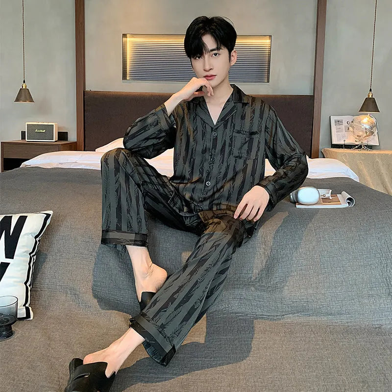 Men's black striped Ice silk long sleeve V-neck pajama set with trousers.