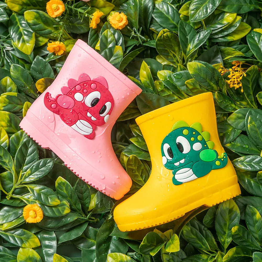 Children's cute waterproof PVC rain boots with cartoon dinosaur pattern in blue, pink, and yellow