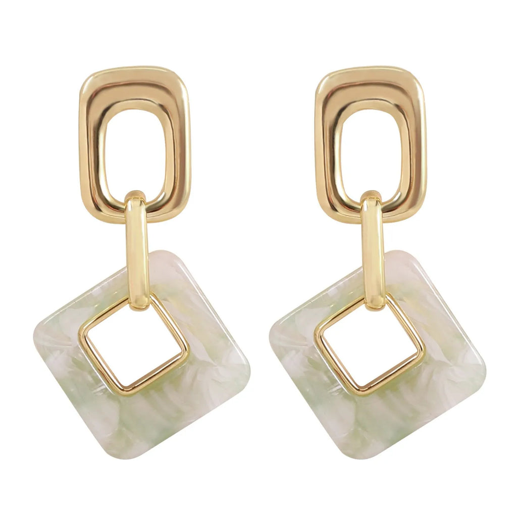 Hollow geometric square earrings with chamfered corners in silver or black