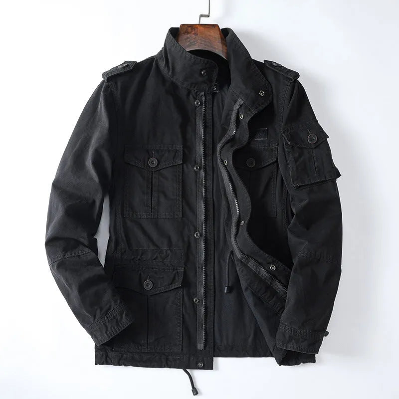 Man wearing a light brown loose-fit cotton zip-up jacket, retro casual style.
