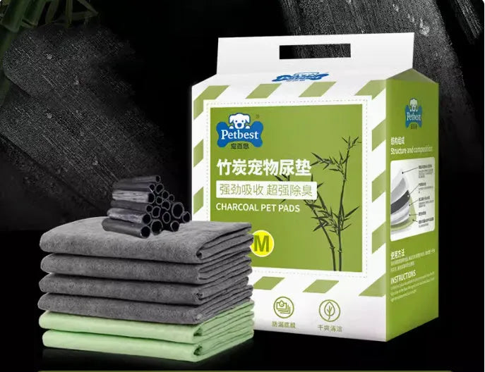 Pack of thickened dog urine pads showing adhesive backing and size options