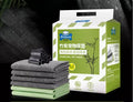 Pack of thickened dog urine pads showing adhesive backing and size options